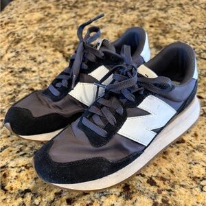 New Balance Black Sneakers with White Accents